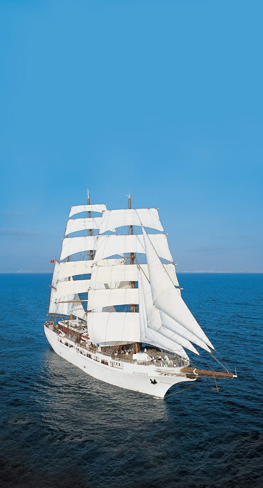 SEA CLOUD II under sail seen from ahead.